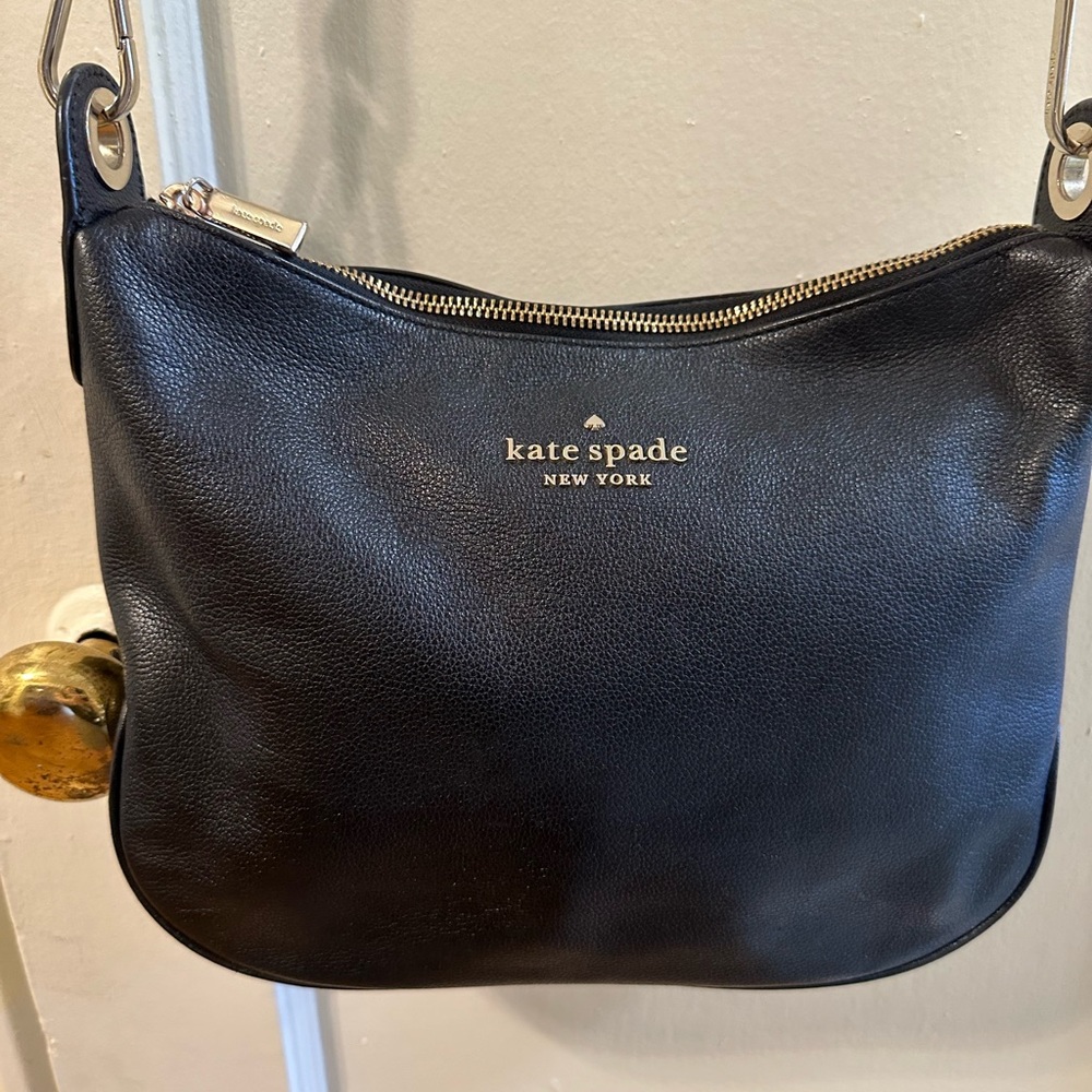 Kate Spade Black Leather Bag
13”L/9”W Handle drop 23” Adjustable